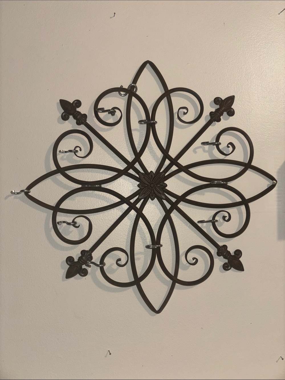 Decorative metal wall hanging jewelry holder